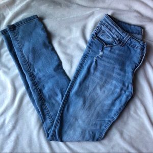 Skinny Jeans with Distressed Design